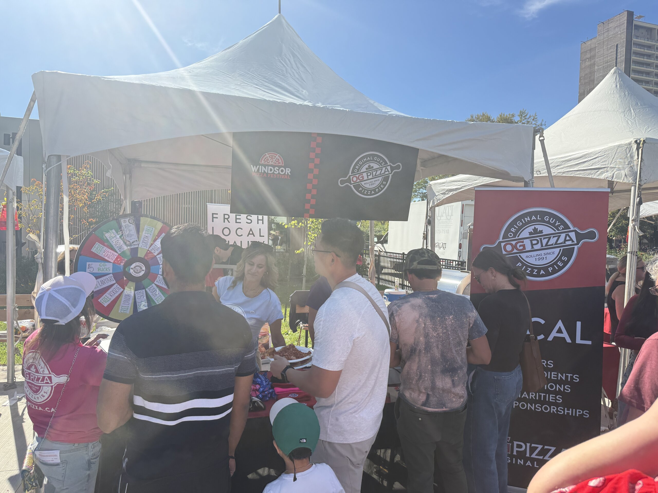 OG Pizza tent with prize wheel at the Windsor Pizza Festival 2026